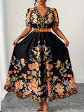 Soleil Floral Flare Maxi Dress — Orange Blossom Boldness on a Black Canvas