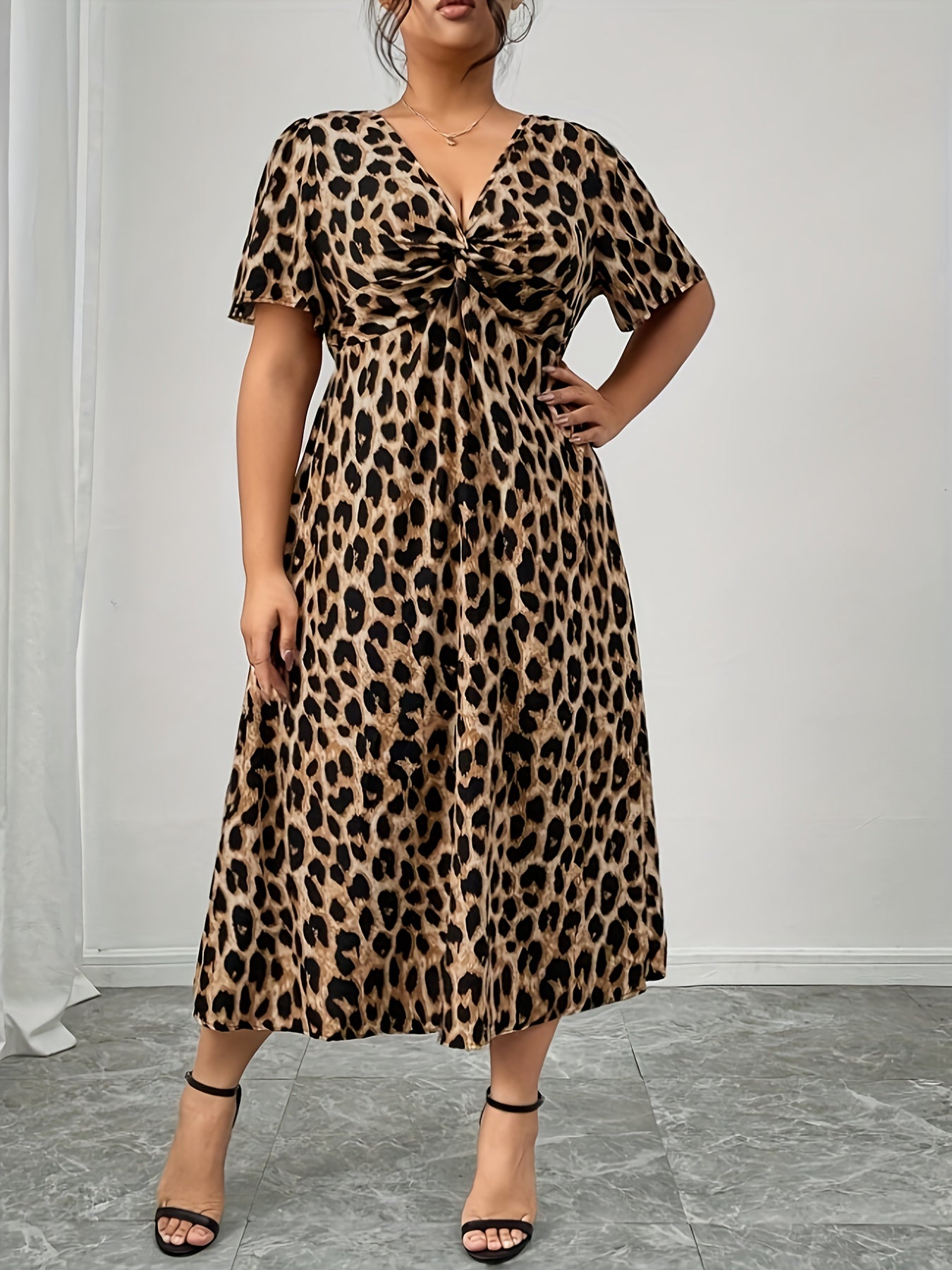 Torsade Vintage Leopard Twist-Waist Dress — Wild Heritage, Sculpted at the Centre