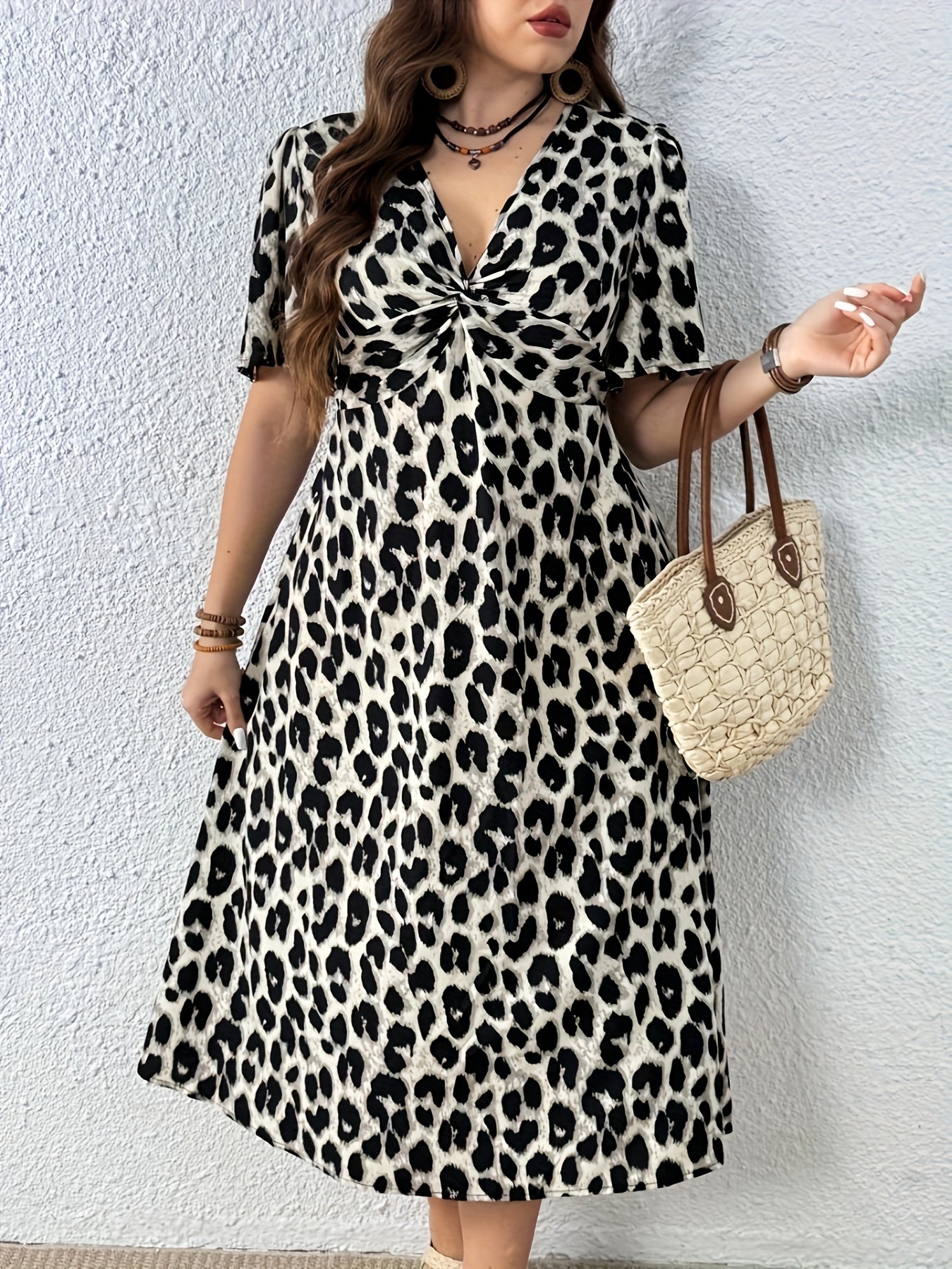 Torsade Vintage Leopard Twist-Waist Dress — Wild Heritage, Sculpted at the Centre